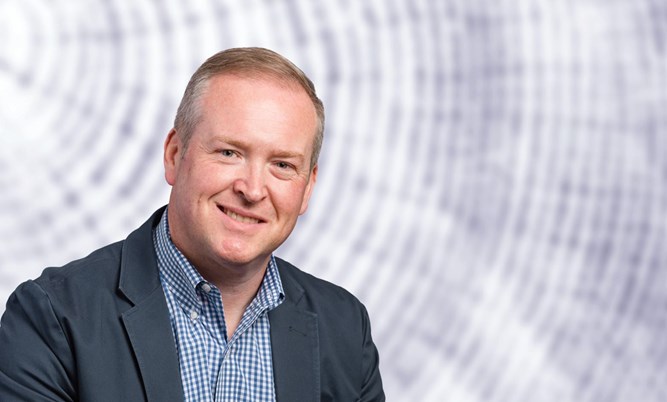 a man wearing a blue shirt