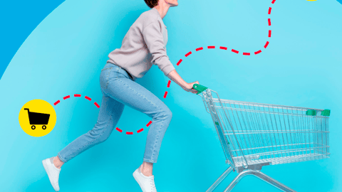 A woman pushing a shopping cart