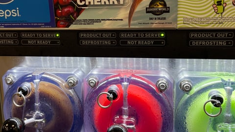 Mission: Colossal Cherry Slurpee Signs