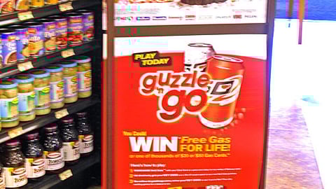 Dominick's Guzzle 'n Go Sweeps Sign