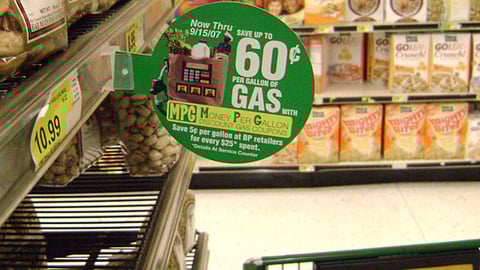 Rainbow Discount Gas Coupon Shelf Sign