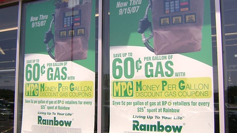 Rainbow Discount Gas Coupons Signage