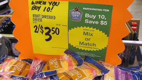 Food 4 Less 'Kick Off to Savings' Shelf Sign