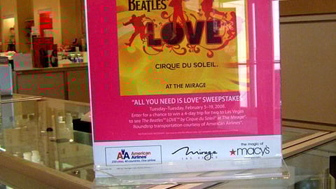 Macy's 'All You Need is Love' Sweeps Counter Sign