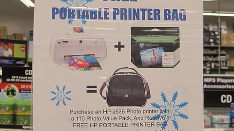 HP Staples 'Free Printer Bag' Sign