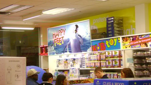 KB Toys 'Happy Feet' Sign