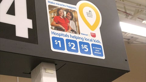Walmart 'Make Miracles Happen' Checkout Sign
