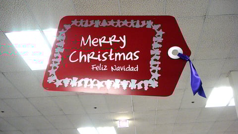 Kmart Bilingual Holiday Ceiling Sign