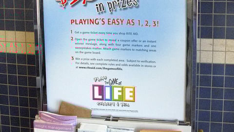 Rite Aid 'Game of Life' Circular Rack Sign