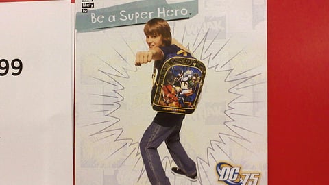 DC Comics Backpacks Sign