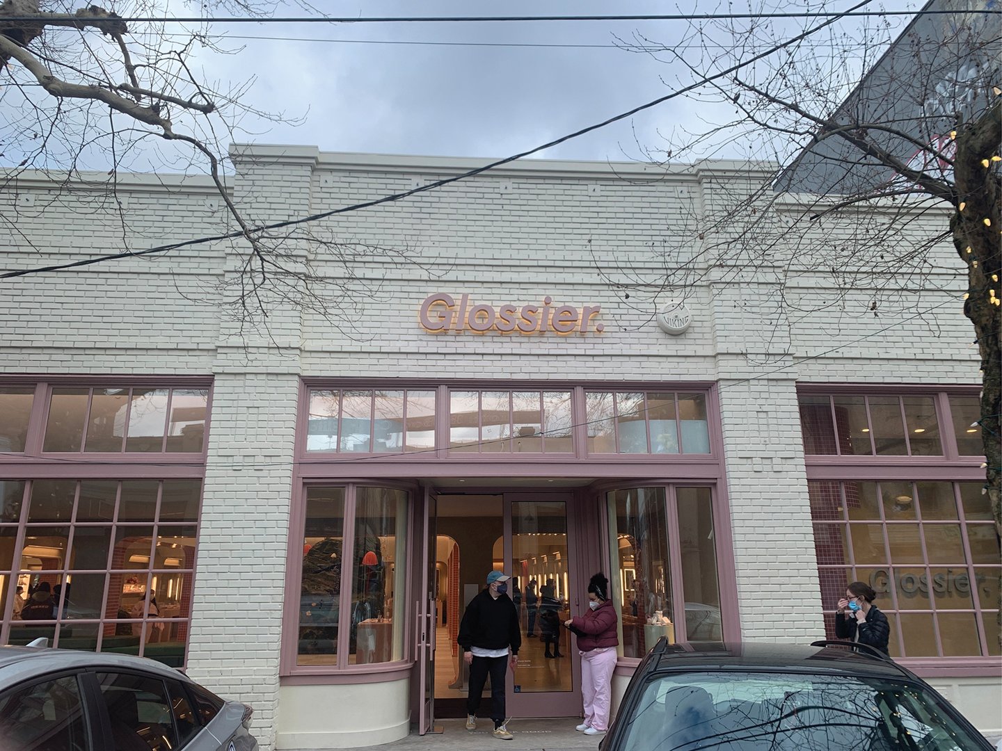 a group of people in front of a building