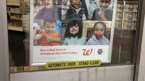 Walgreens 'We're Committed To Keeping Kids Healthy' Entrance Sign