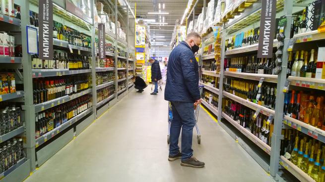 a person standing in front of a store